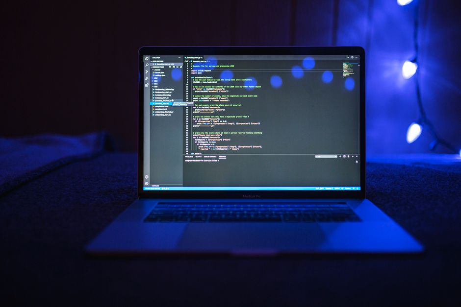 developer coding artificial intelligence laptop