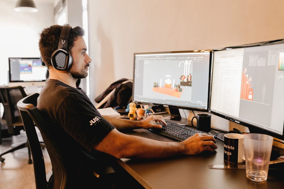 game developer working computer setup
