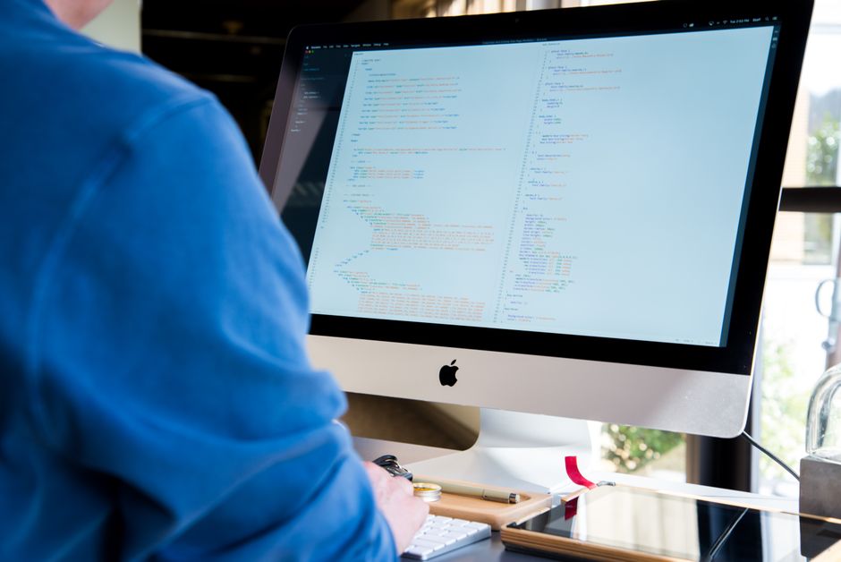 programmer coding computer screen