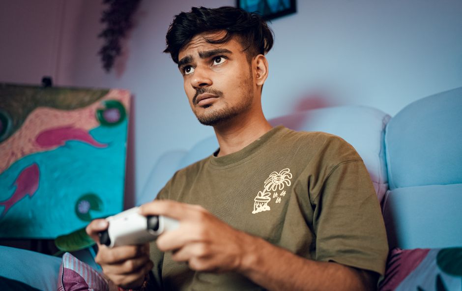 person playing video game scared